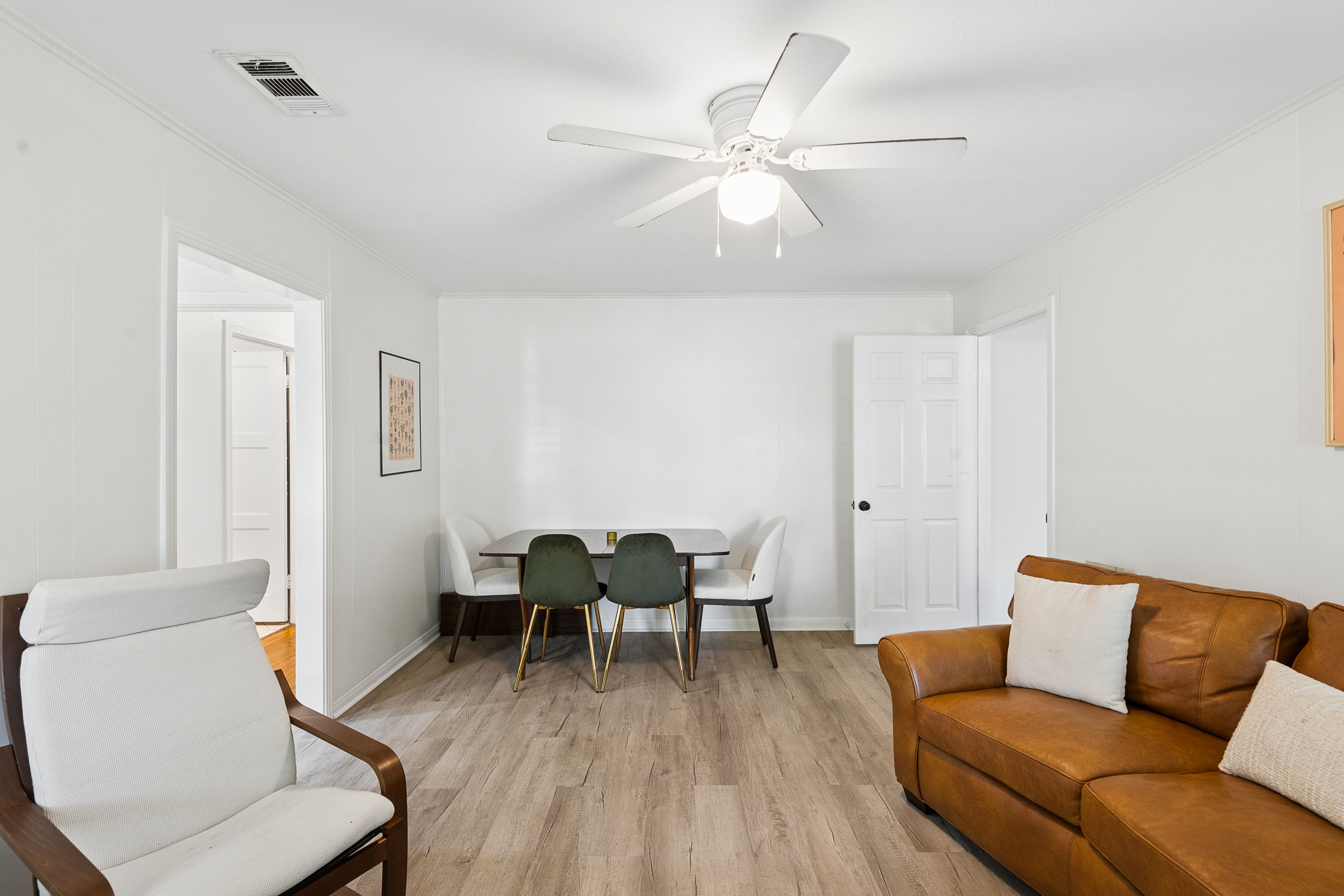 Living room with hardwood floors at 2821 S Hills Ave